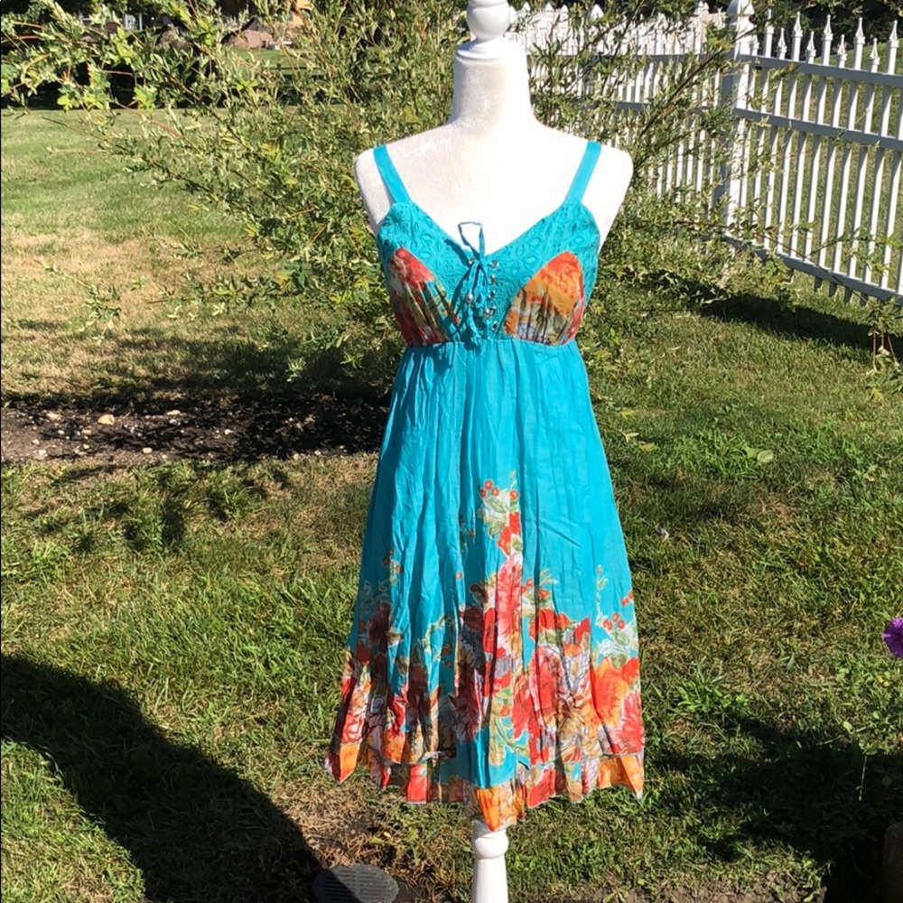 VASNA AQUA SUNDRESS WITH FLORAL PRINT.